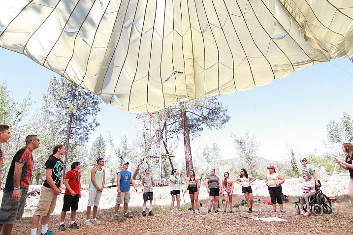 Campers Under the Large Parachute 