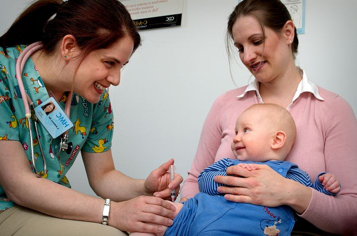 Mom and Baby getting Shot from Nurse 